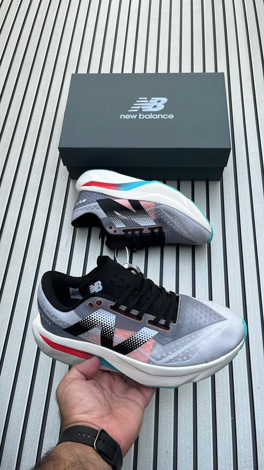New Balance SC Elite v4 Carbon Racing Shoes – Grey Black